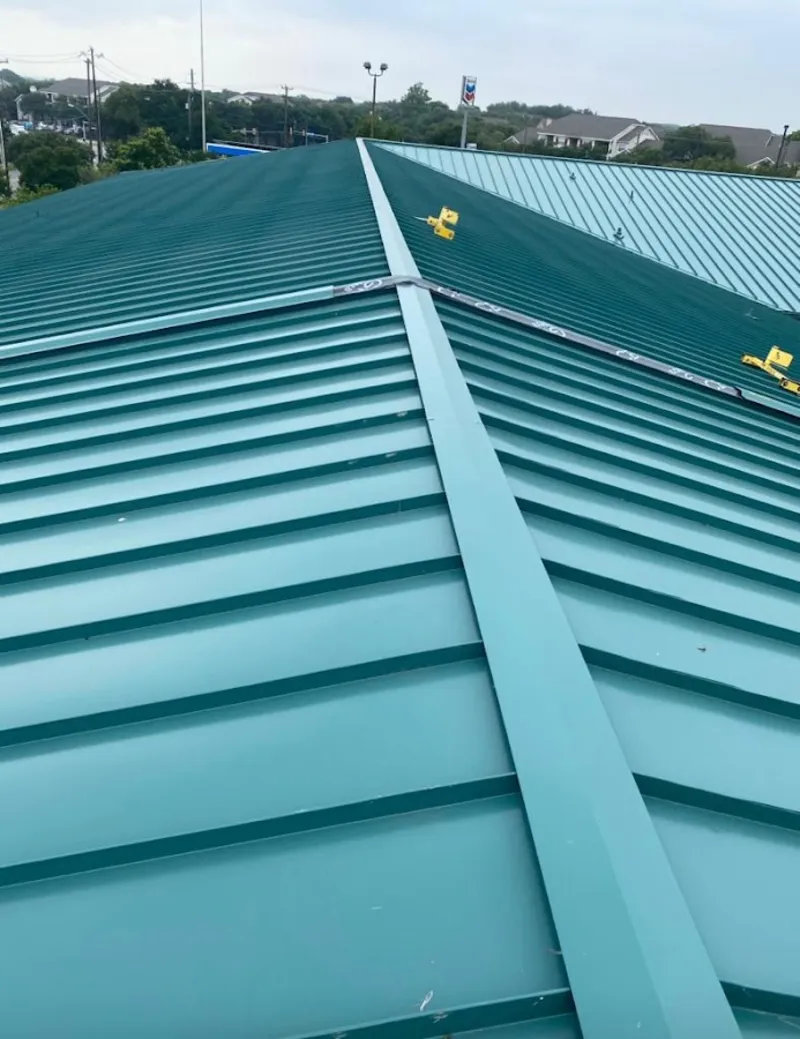 Green commercial metal roof ridge and valley for Metal Roof Repair in Dalton